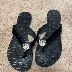 Tory Burch size 9M used/ good condition black flip flop sandals.